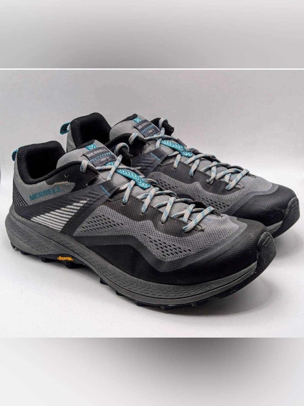 Merrell Women's Gray and Black Trail Runners with Teal Accents